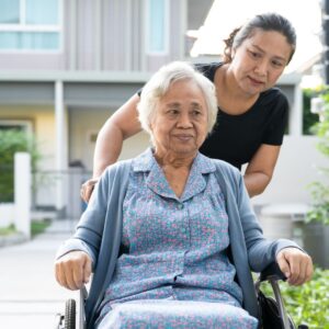 A woman caring for her grandmother.